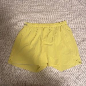 Used Mens neon  Lululemon shorts 6” with liner
